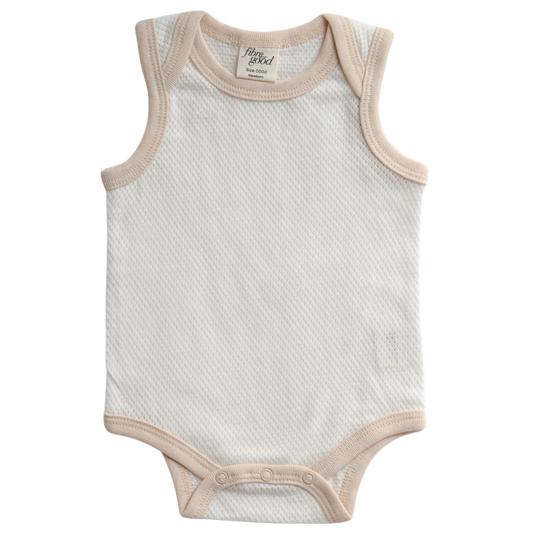 A sleeveless organic cotton mesh bodysuit for babies, with snap buttons at the bottom.