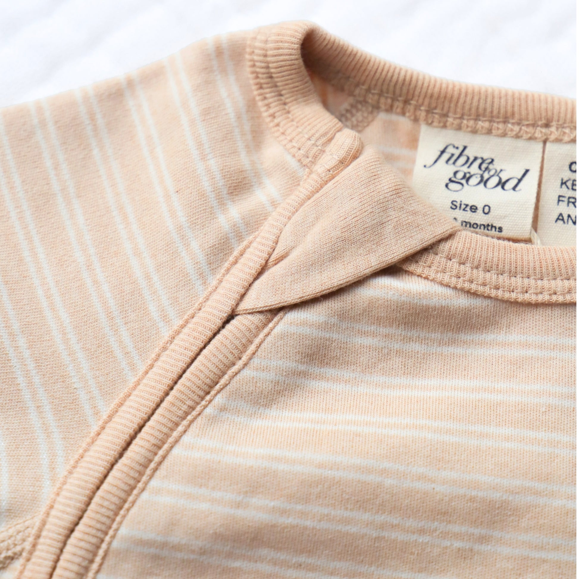 Organic jumpsuit stripe interlock concealed zip  detail 