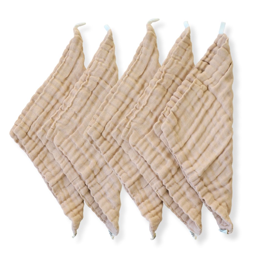A set of beige organic cotton reusable baby wipes in brown undyed 