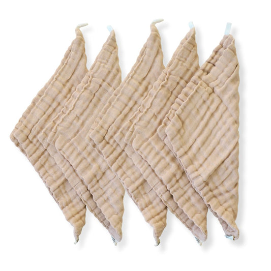A set of beige organic cotton reusable baby wipes in brown undyed 