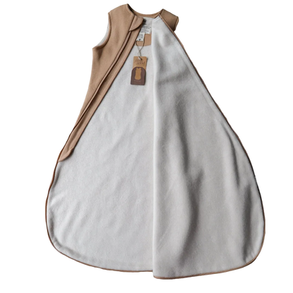 Organic cotton sleeping bag with a 2.5 TOG rating, featuring a 2-way opening zipper and designed for infants. Undyed 