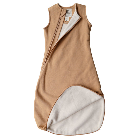 Organic cotton sleeping bag with a 2.5 TOG rating, featuring a 2-way opening zipper and designed for infants. Undyed 