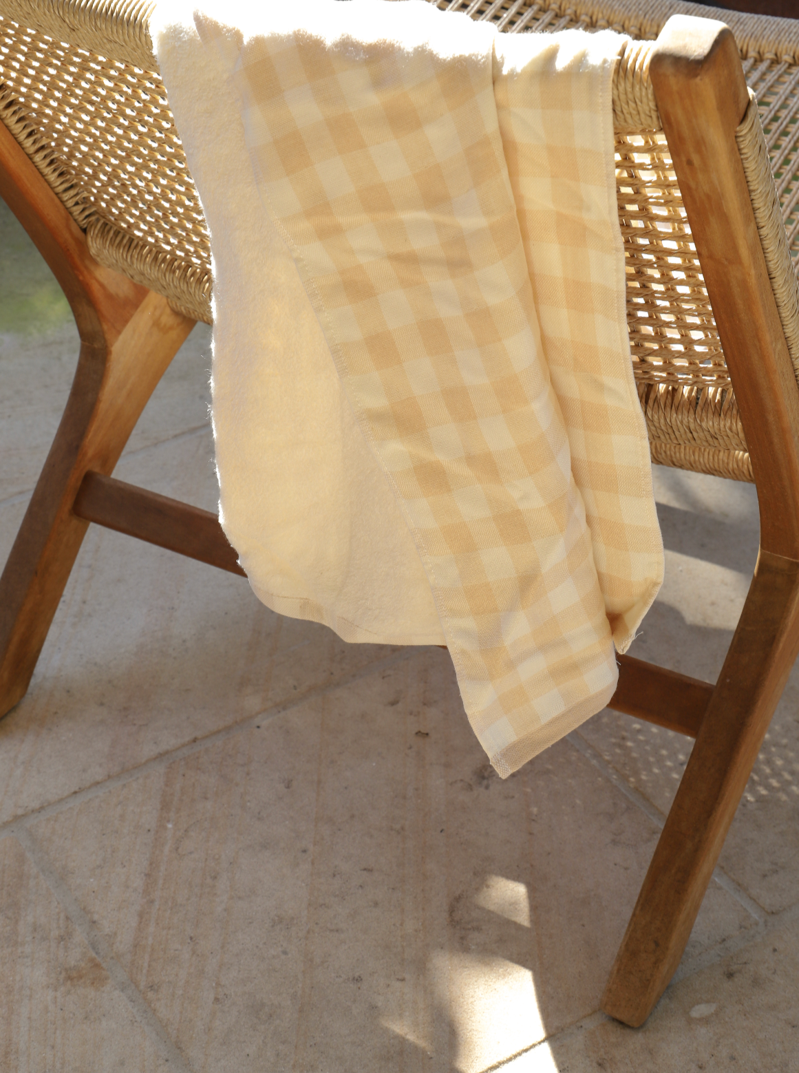 Super soft towel hanging on chair